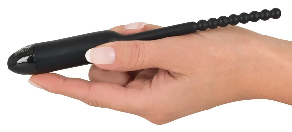Schwarzer Vibrator mit Perlenkette für intime Massage und Luststeigerung