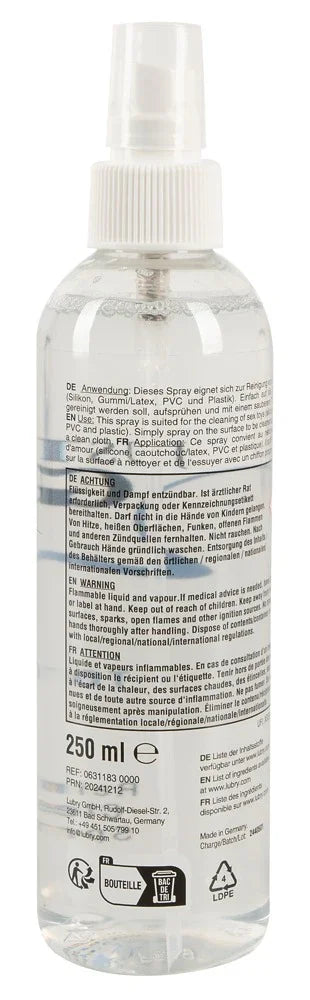 Transparente Sprühflasche mit 250 ml Toy Cleaner für Sexspielzeug, steht aufrecht, Etikett sichtbar.