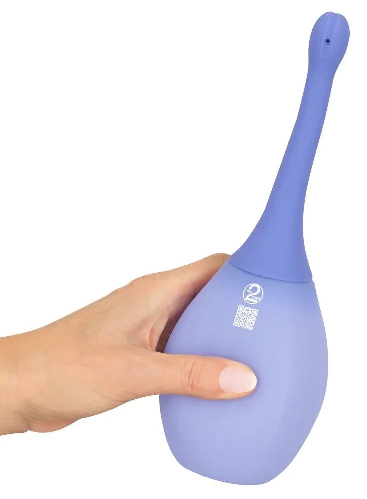 Lila Duschschaumspender mit ergonomischem Griff, ideal für Intimhygiene und Pflege im Liebesleben