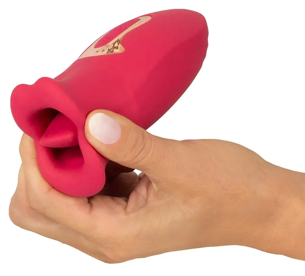 Rosa Vibrator mit Lippen-Design, gehalten in Hand, für intime Momente