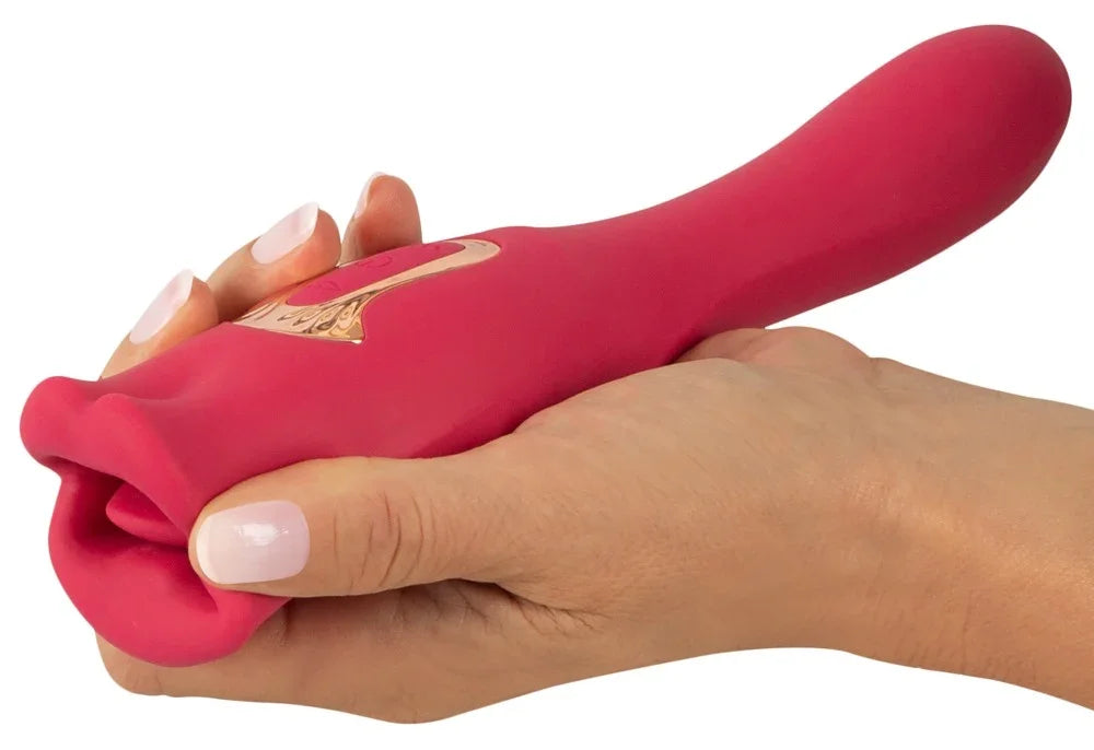Rosa Vibrator mit Lippen-Design in Hand, ideal für intime Momente und Liebesleben