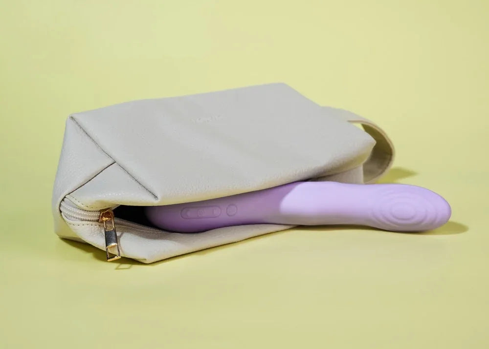Lila Vibrator in cremefarbener Tasche – diskretes Liebesleben Zubehör