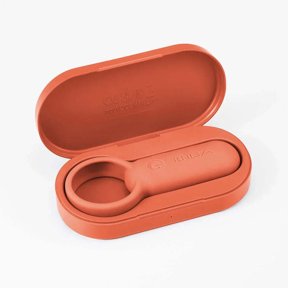TENGA Vibrator in orangefarbenem Ladeetui für diskretes Liebesleben