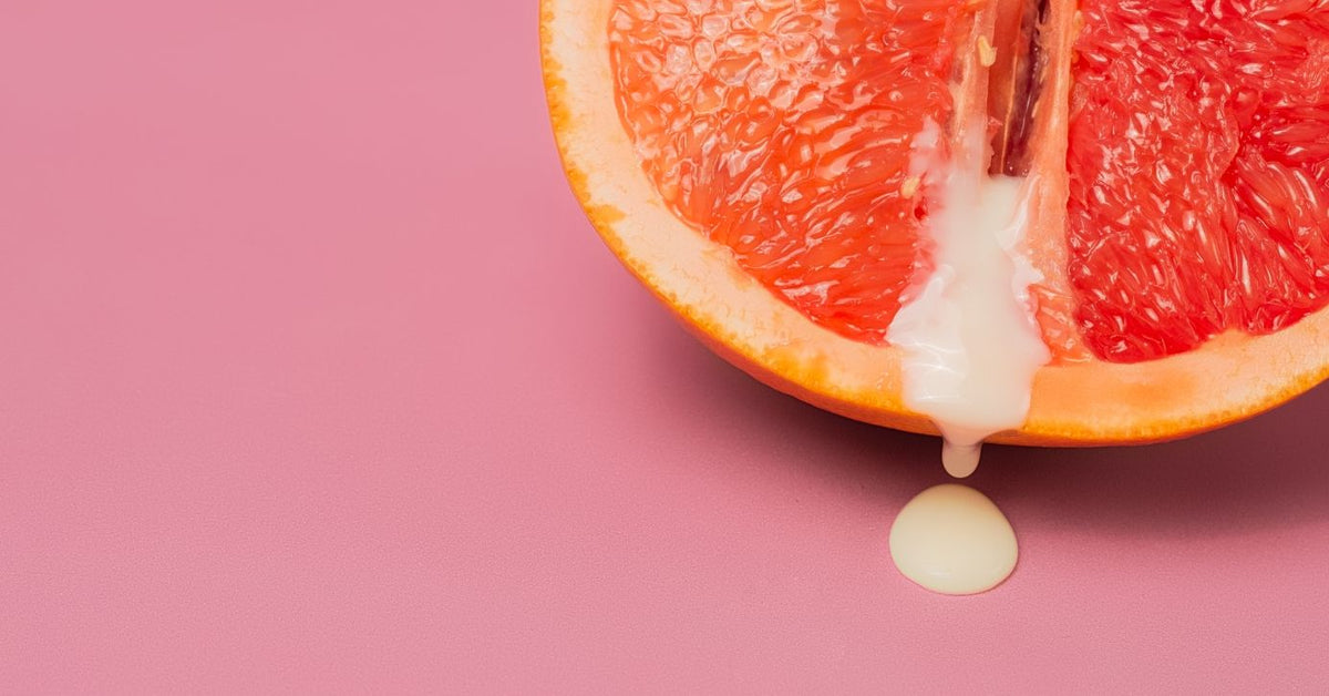 Halbe Grapefruit mit weißem Tropfen, Symbolbild für Gleitgel und Luststeigerung