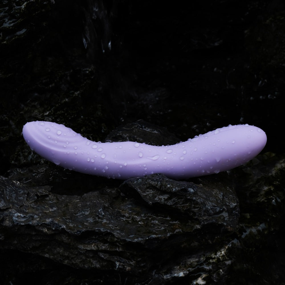 Vibrator "Selena" aus Silikon - mit Stossvibratorion 21 cm (lila)