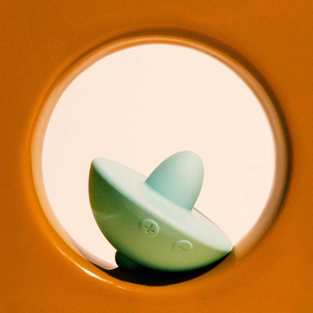 Vibrator "Toupie Puissante" made of medical silicone - in spinner design (turquoise)