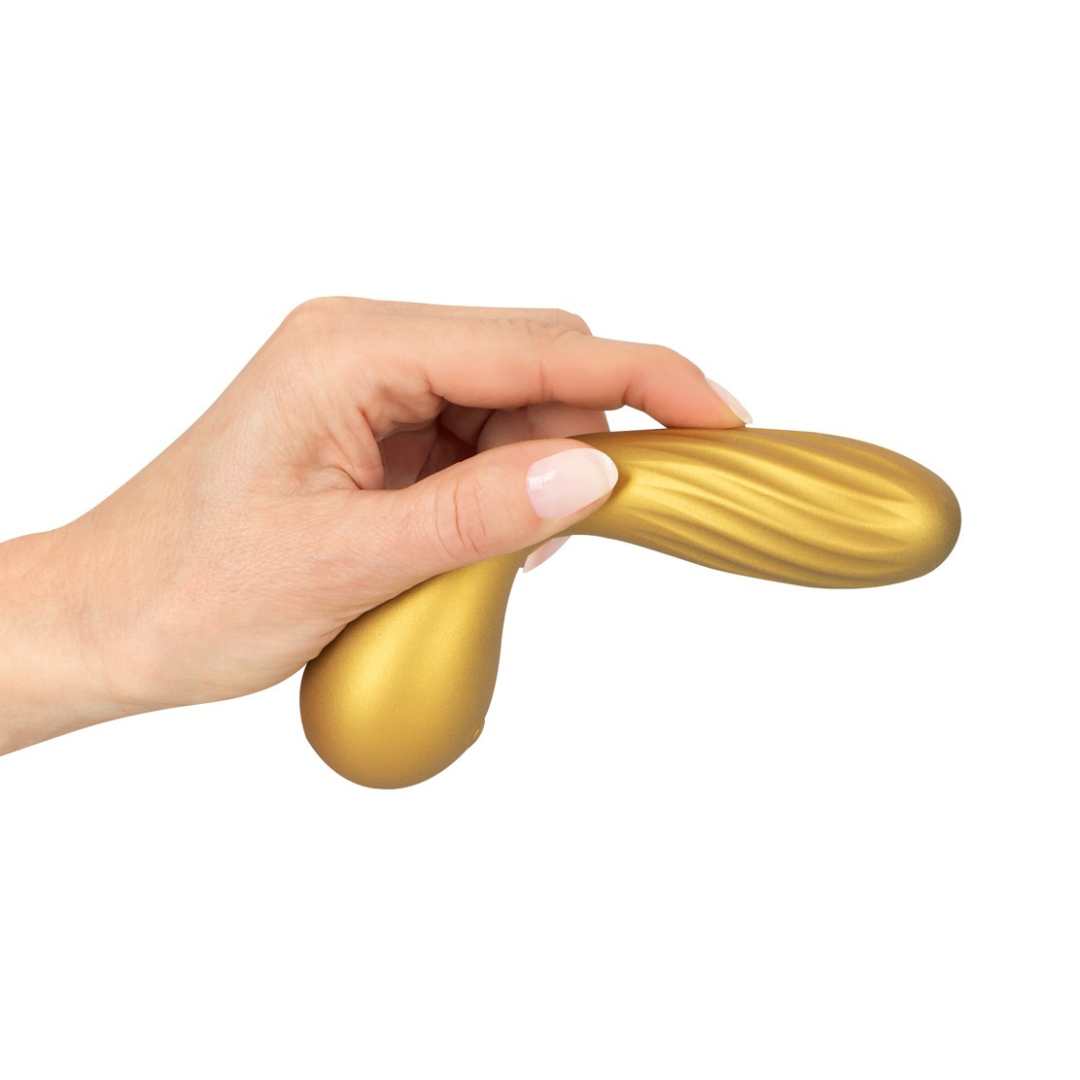 Vibrator "Flexible Swirl" made of silicone - with movable grooved head 16 cm (yellow)